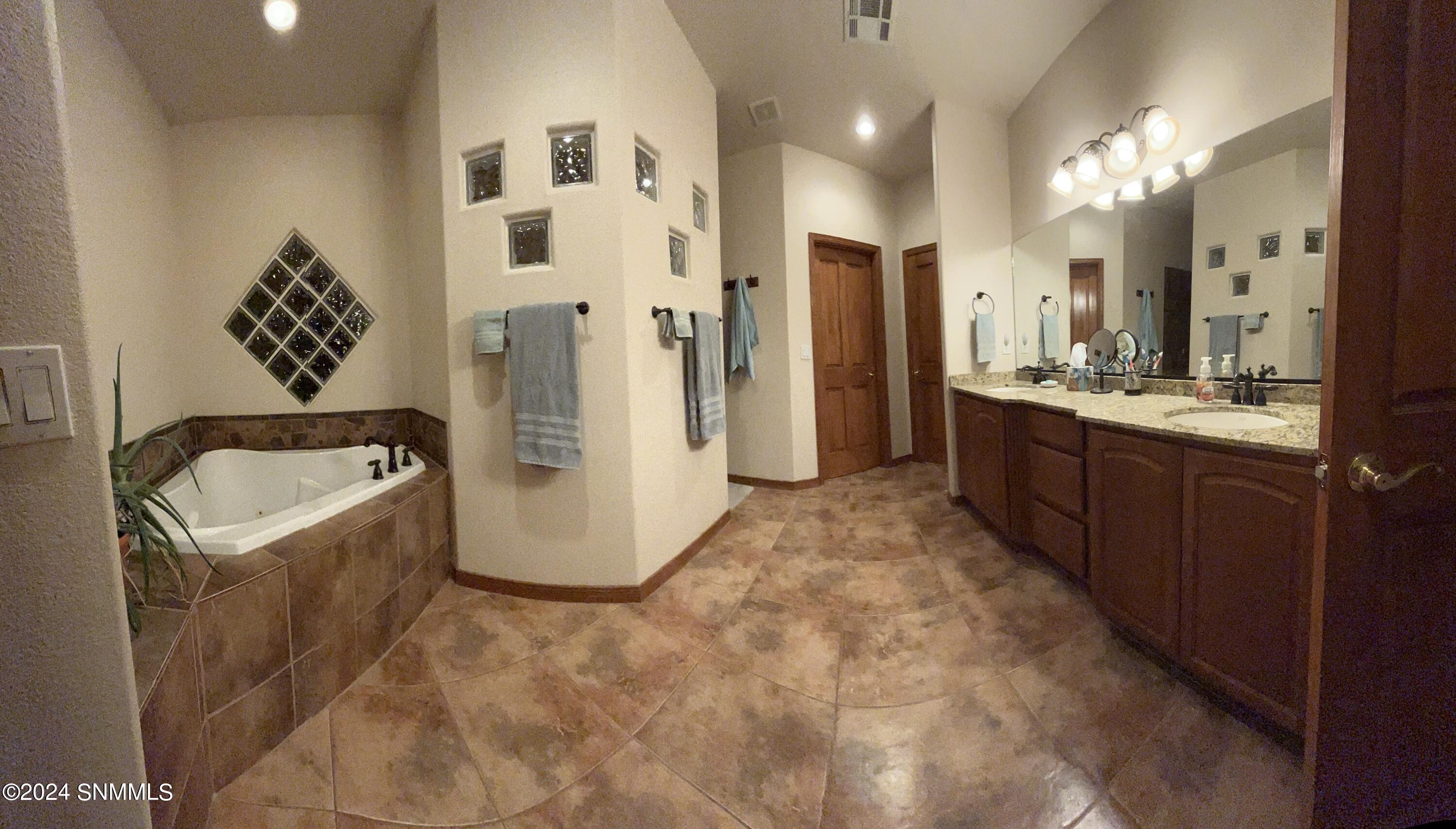 19. Master Bathroom with double sinks, j