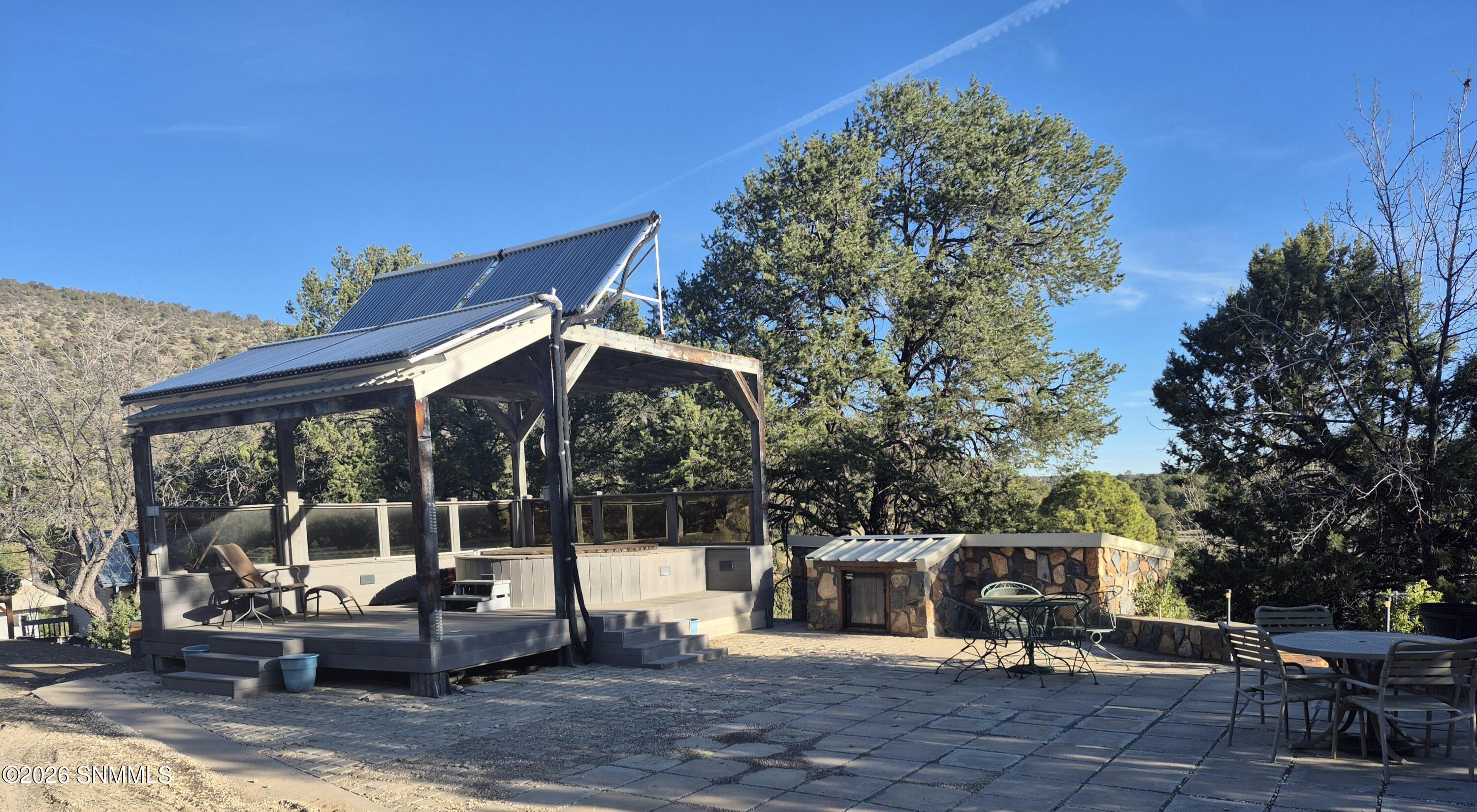 pergula soaking tub and patio