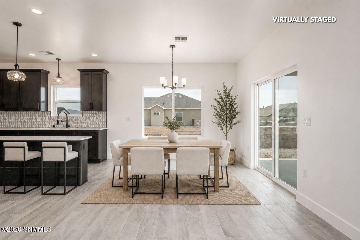 6537 Swan - Dining Virtually Staged