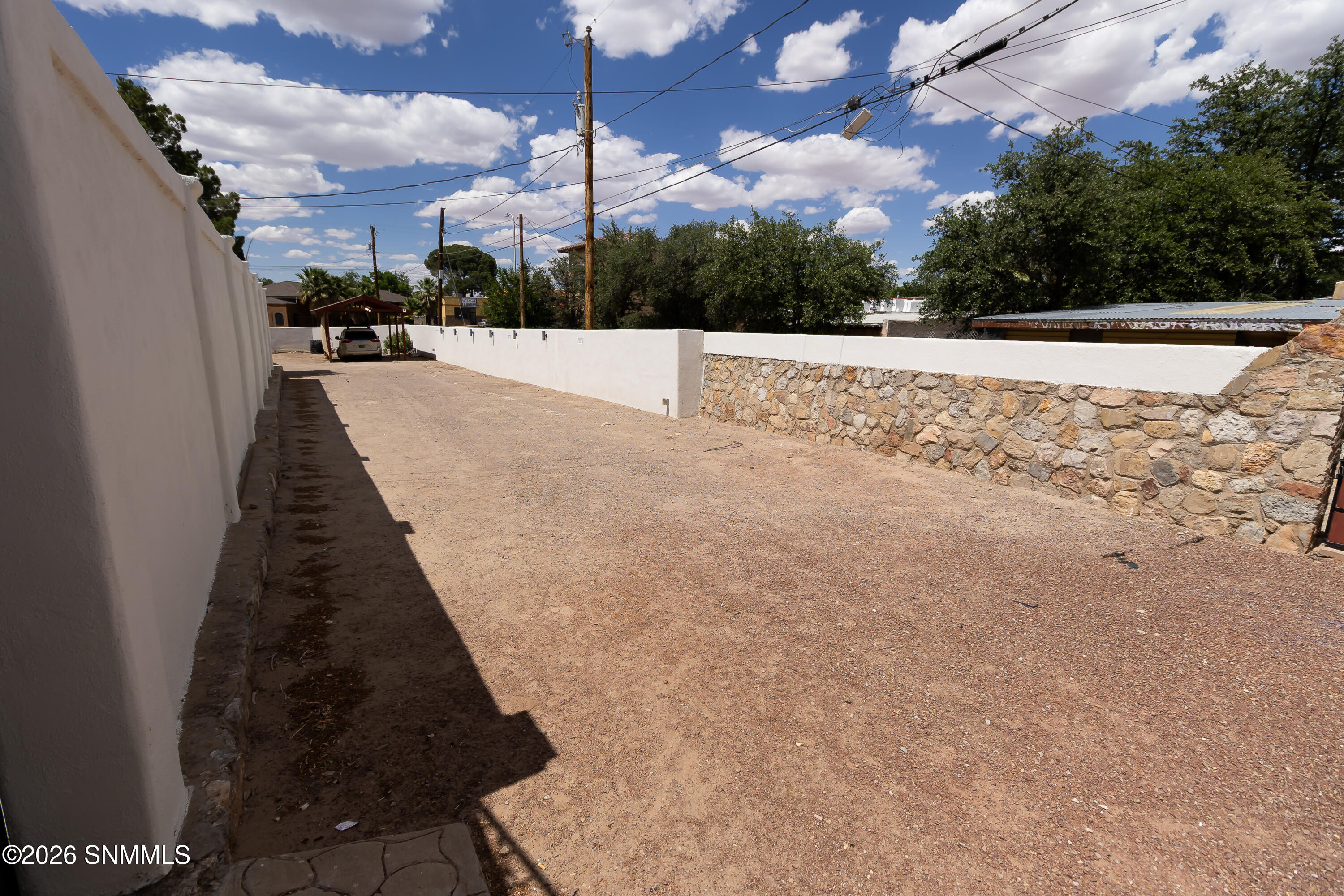 Covered parking by the gardens