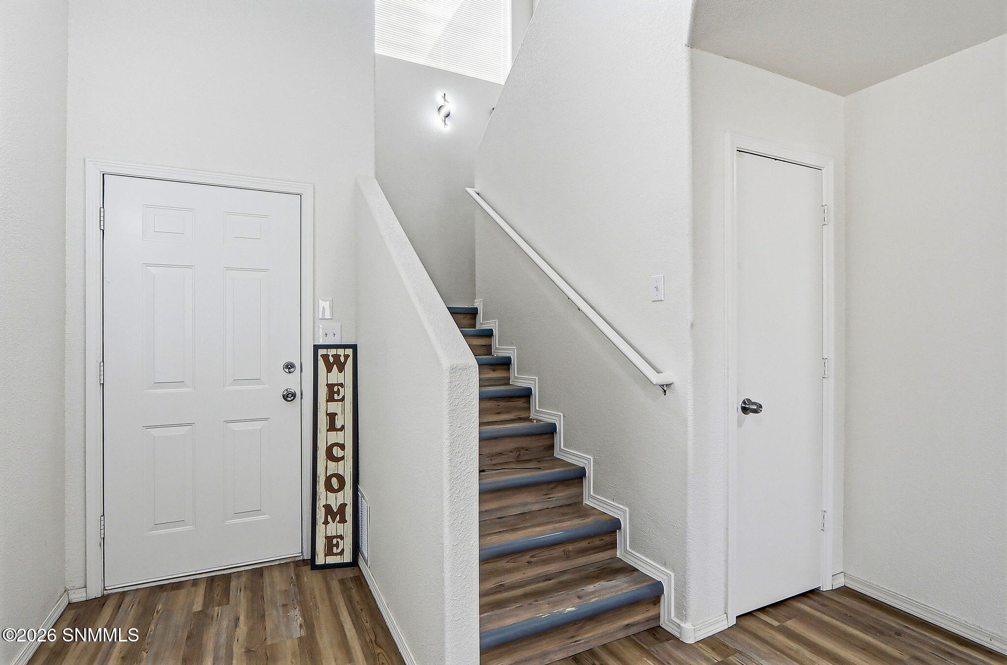 FRONT DOOR-LIVING ROOM -CLOSET