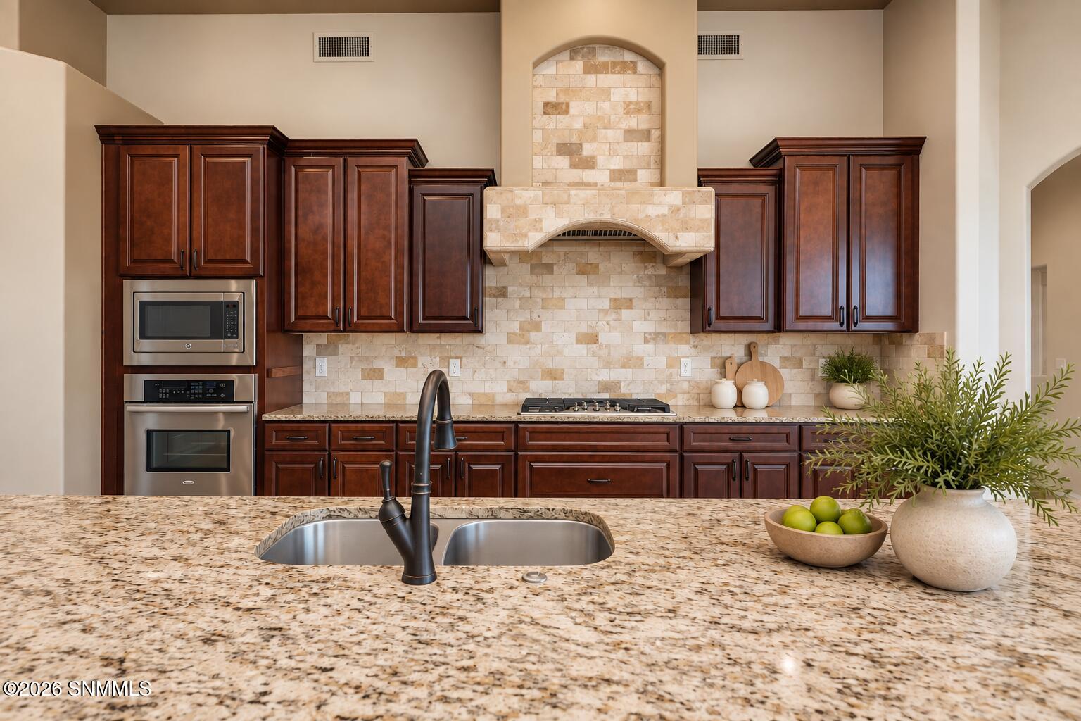 wide_well_lit_modern_kitchen_interior_sc